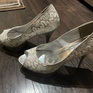 Silver and white dress shoes lightly worn very pretty